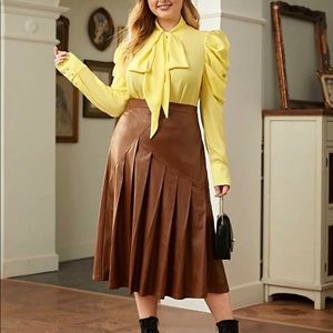 Plus size pleated faux leather skirt